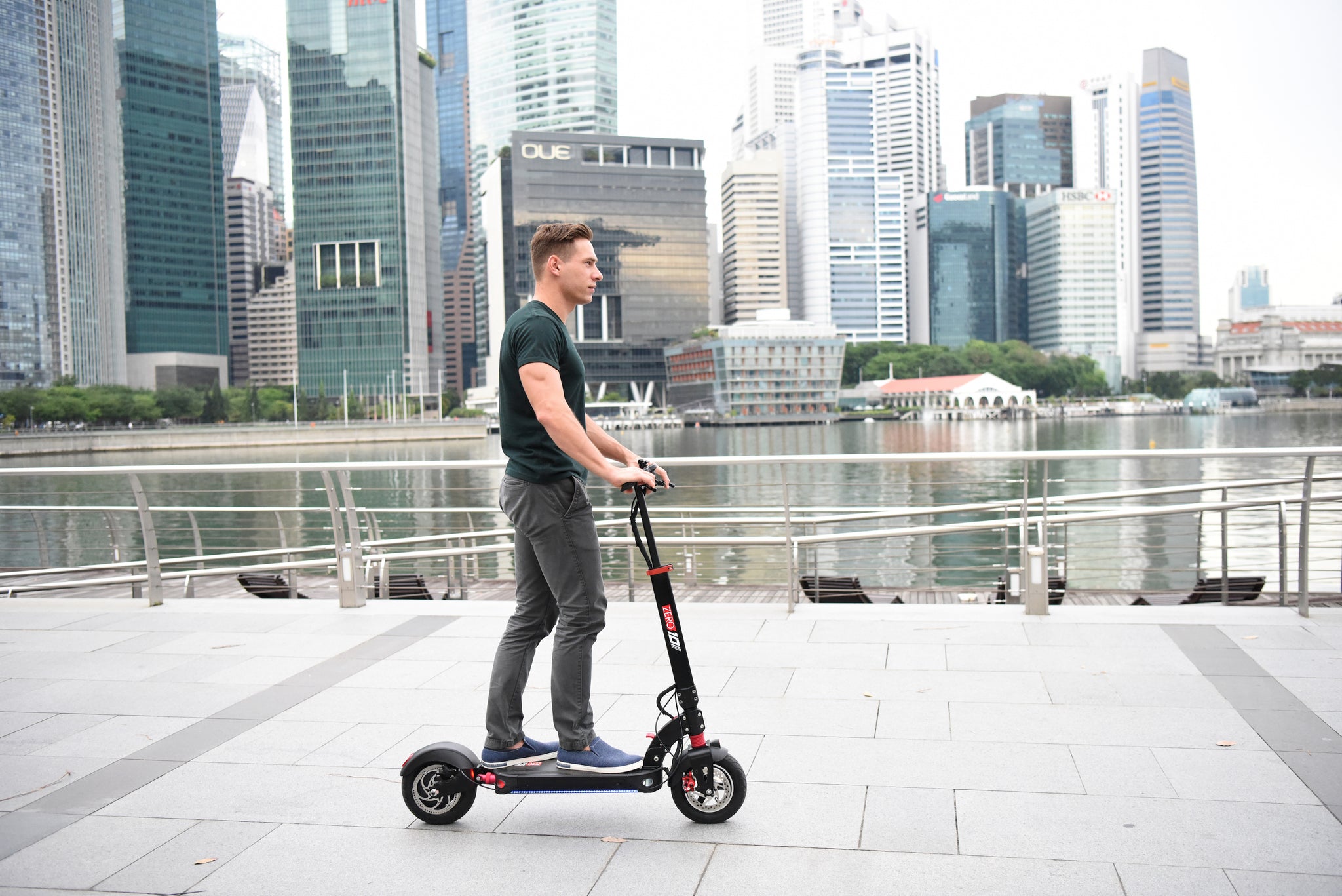 Guy on ZERO 10 scooter in business district
